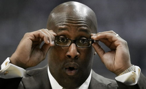 Mike-Brown-holding glasses